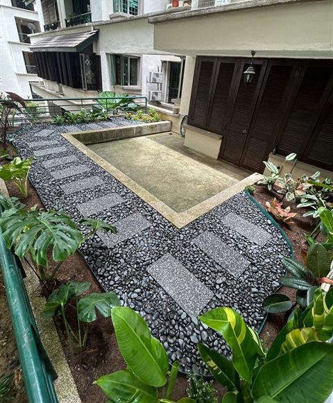 Pebble and stepping-stone path in a courtyard